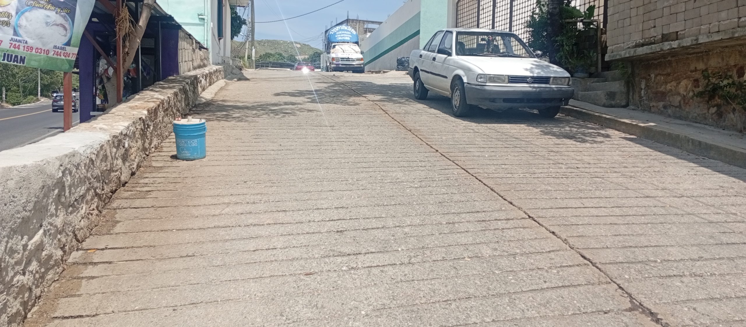 Pavimentación de calle sin nombre por el Centro de Salud, Lomas de San Juan